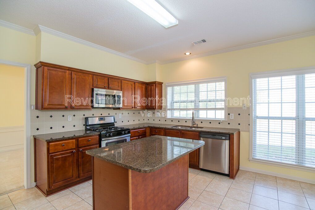 Charming Single Family Home on Crossington Road with Fireplace and Private Yard property image