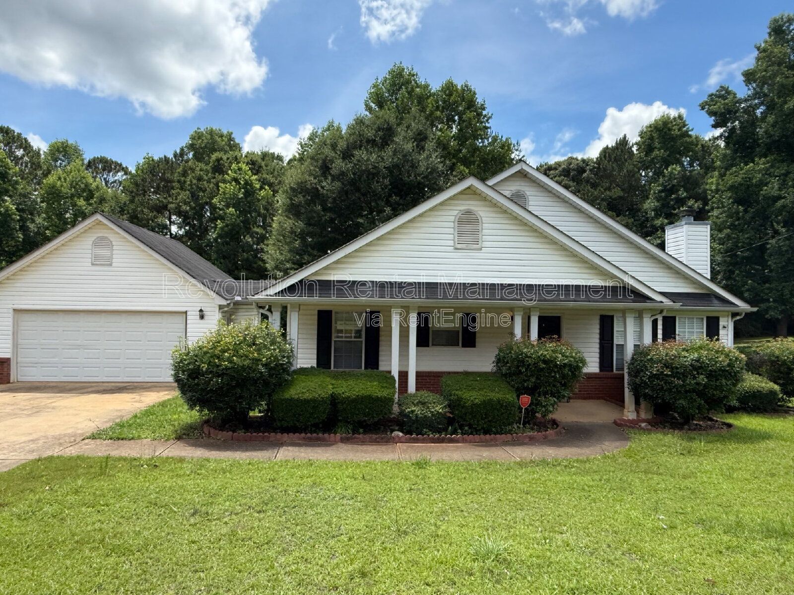 1,268 Sq Ft Single-Family Home in Covington, GA | Deck, 2-Car Garage & Fireplace property image