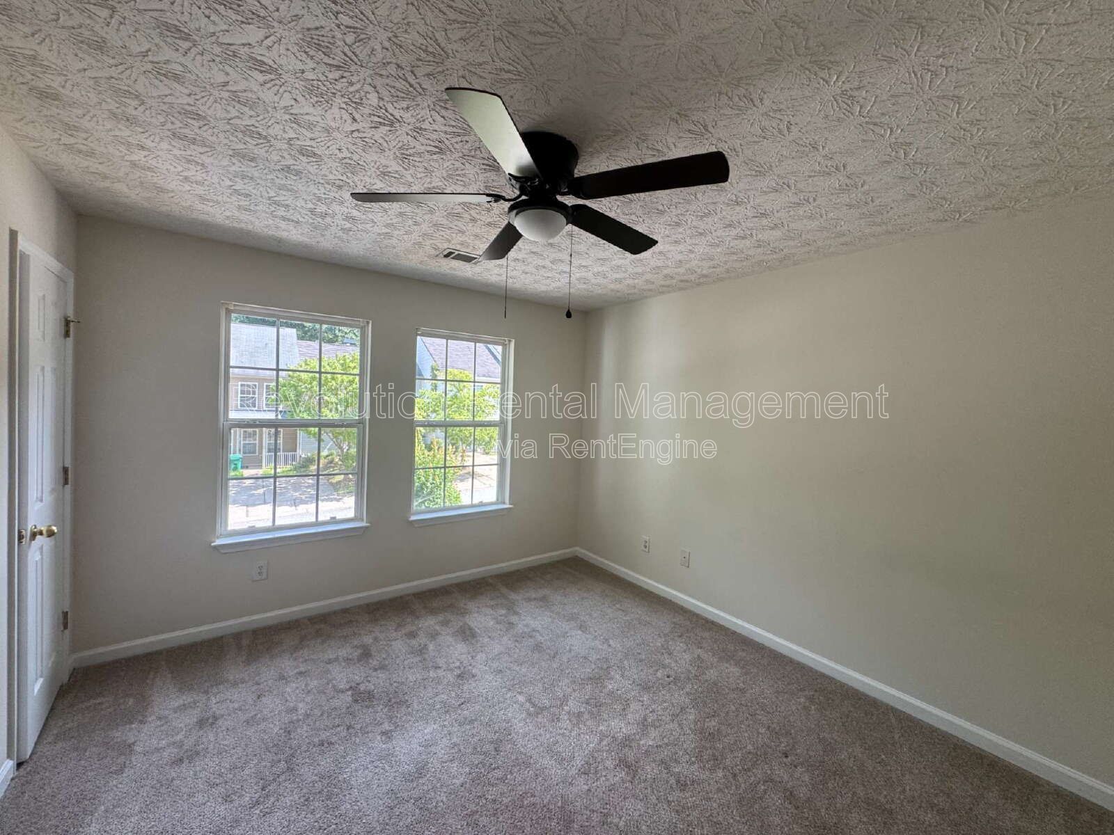 Built in 2004, this two-story townhouse in the Wellington Walk community offers 1,205 square feet... property image