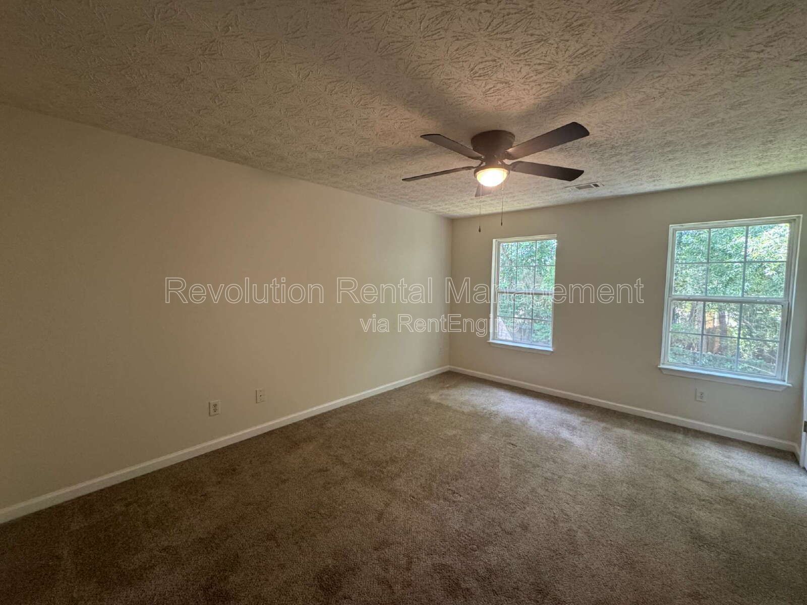 Built in 2004, this two-story townhouse in the Wellington Walk community offers 1,205 square feet... property image