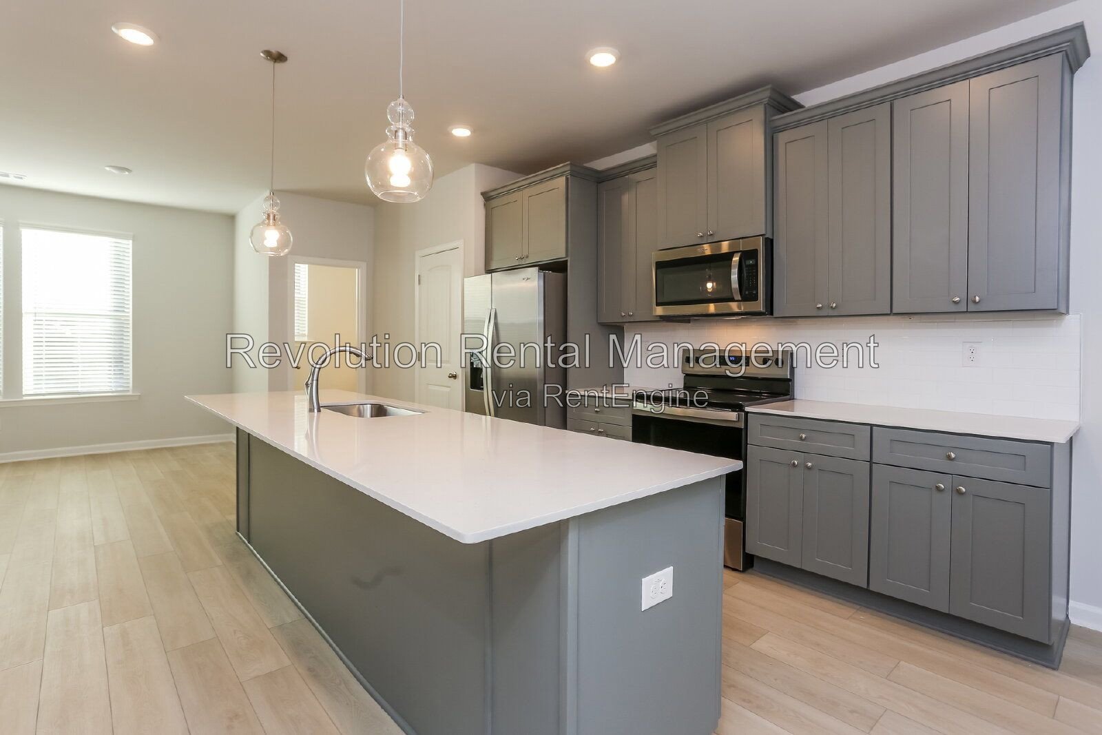 2023-Built Townhouse in Monticello | Garage, Hardwood Floors & Patio | Minutes to I-75 & I-285 property image