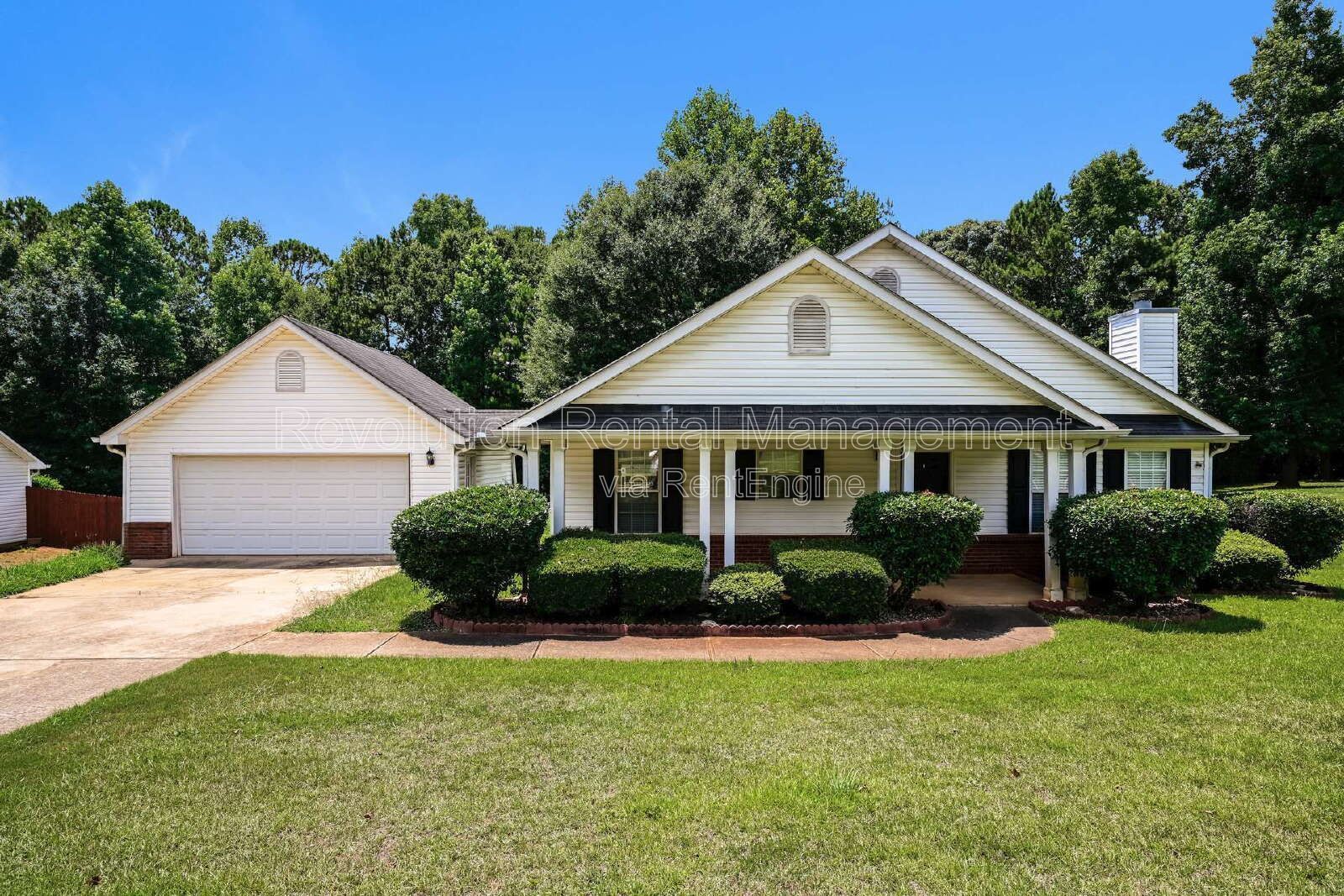 1,268 Sq Ft Single-Family Home in Covington, GA | Deck, 2-Car Garage & Fireplace property image